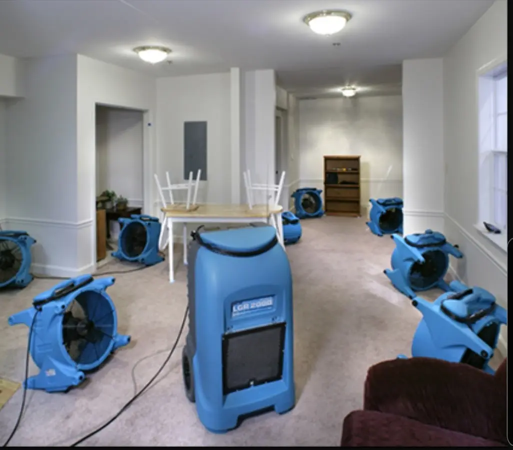 Air movers and dehumidifier setup for Water Damage Restoration in Wheatfield